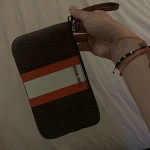 Brown Michael kors bag wallet with orange and white stripe